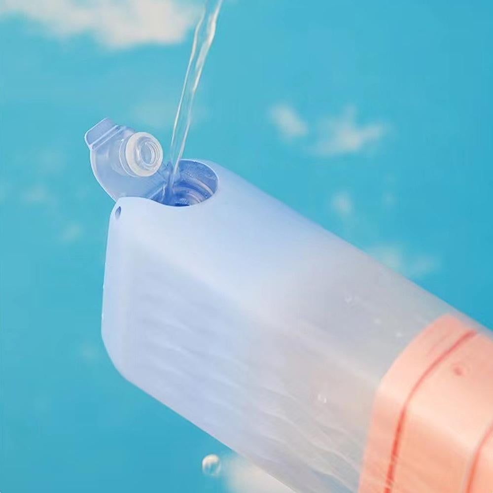 Mini Portable Oral Irrigator Rechargeable Water Dental Flosser With Stretchable Water Tan -Pink